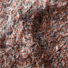Granit vid Råarbetad sten