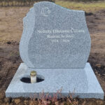 E078 in light grey granite. Polished planting base, recessed inscription painted antique white.